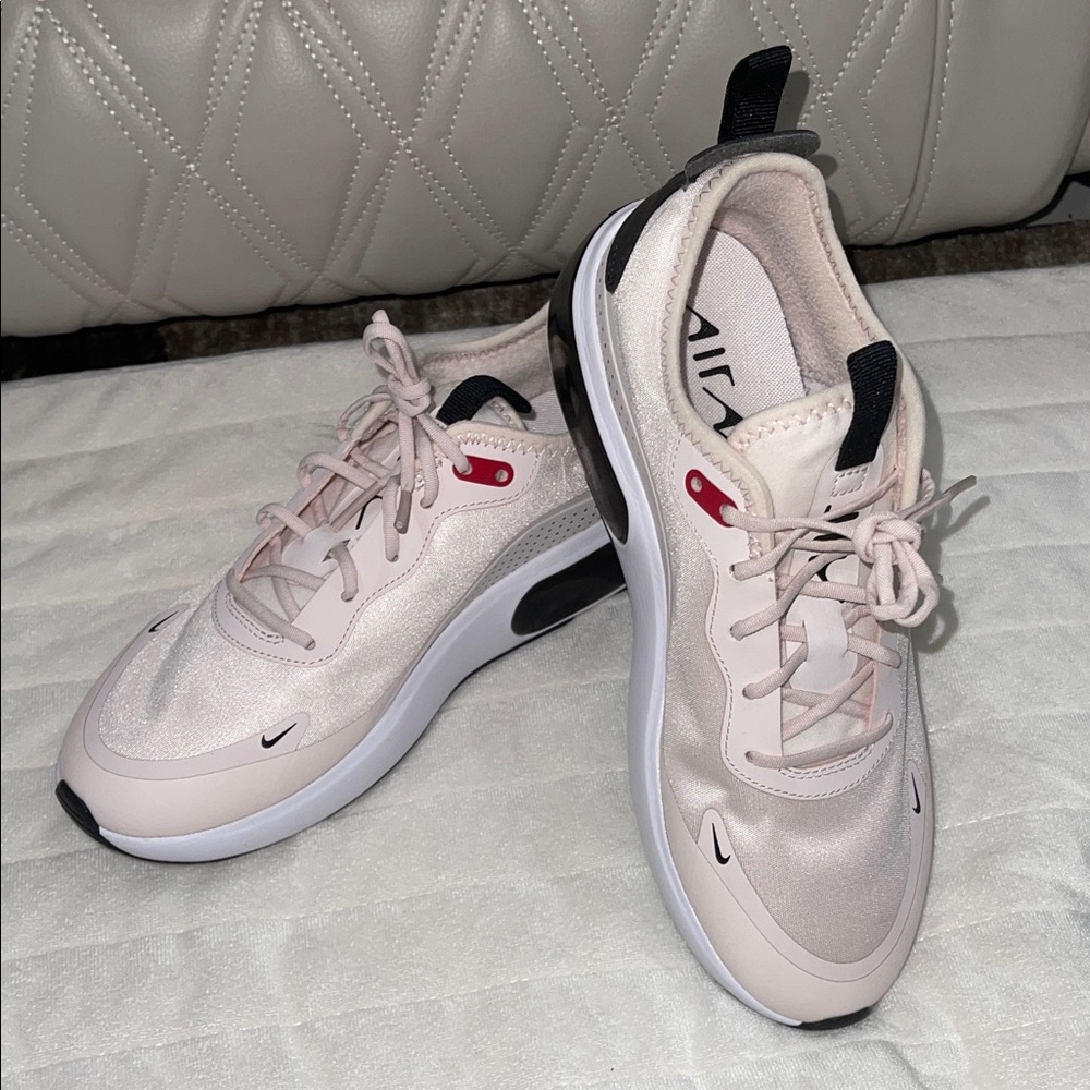 Nike air max  in the light soft pink/red black color way.  size 7